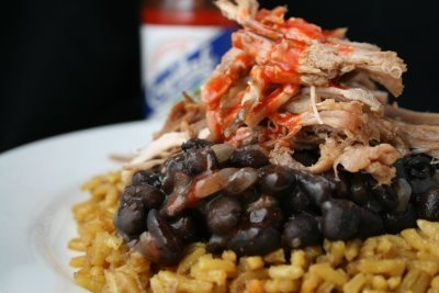 roast pork with black beans and yelow rice